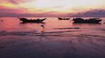 夕阳下的海面渔船美景