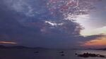 海边绚丽晚霞与船只景象