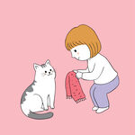 女孩给猫咪围围巾的温馨场景