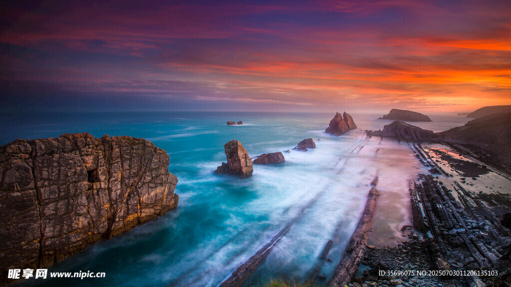 海边壮丽日落岩石景观