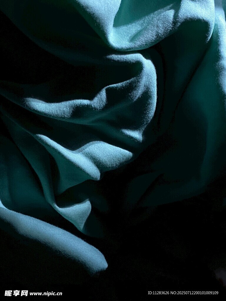 蓝绿色褶皱布料纹理
