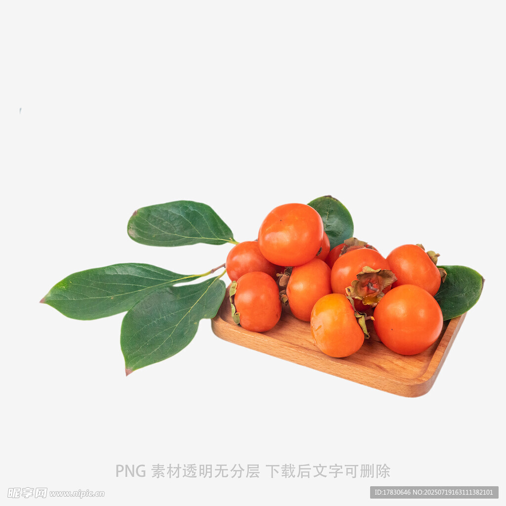 木盘上的鲜橙柿子与绿叶
