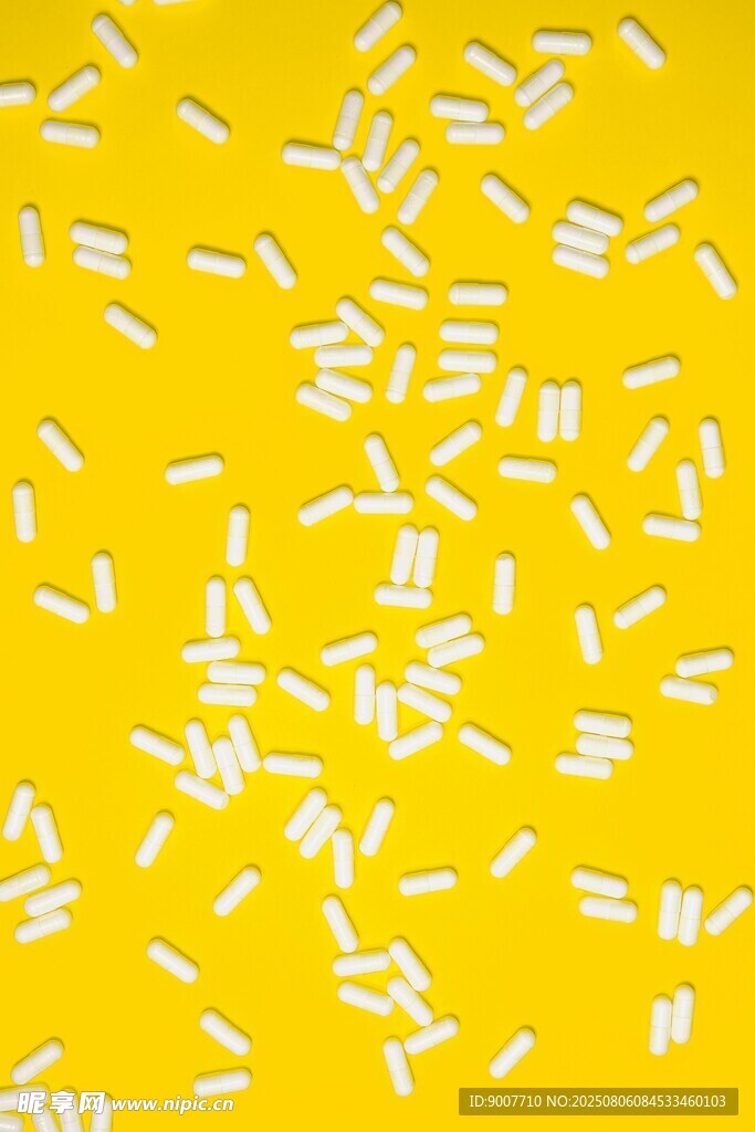 黄色背景上的白色细碎物体