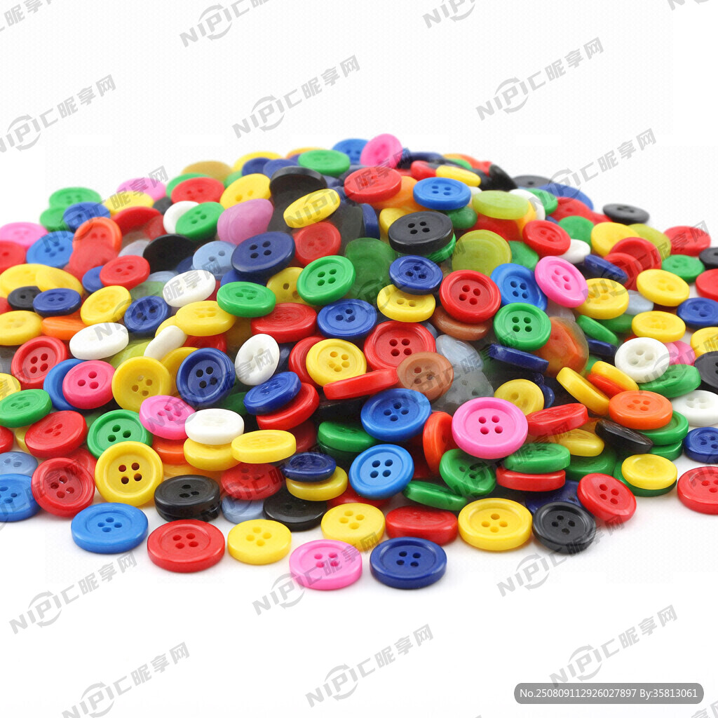 很多很多五彩斑斓的塑料纽扣重叠