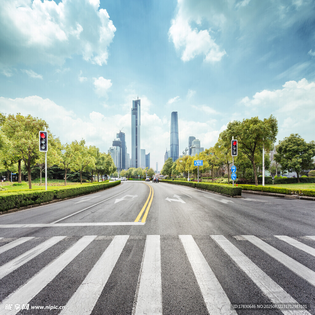 宽阔城市道路与远处高楼
