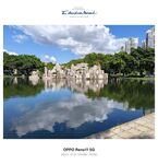湖畔石景与城市建筑倒影