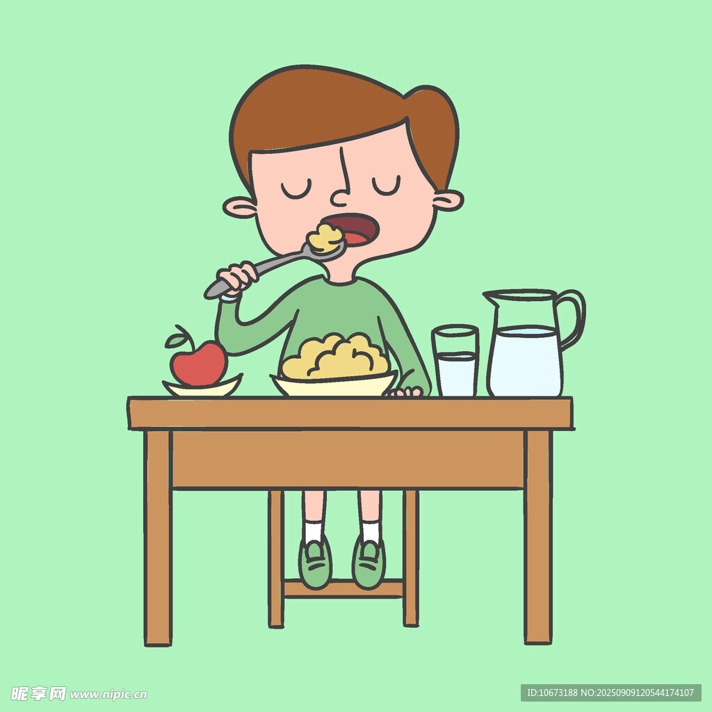 男孩坐在桌前开心用餐