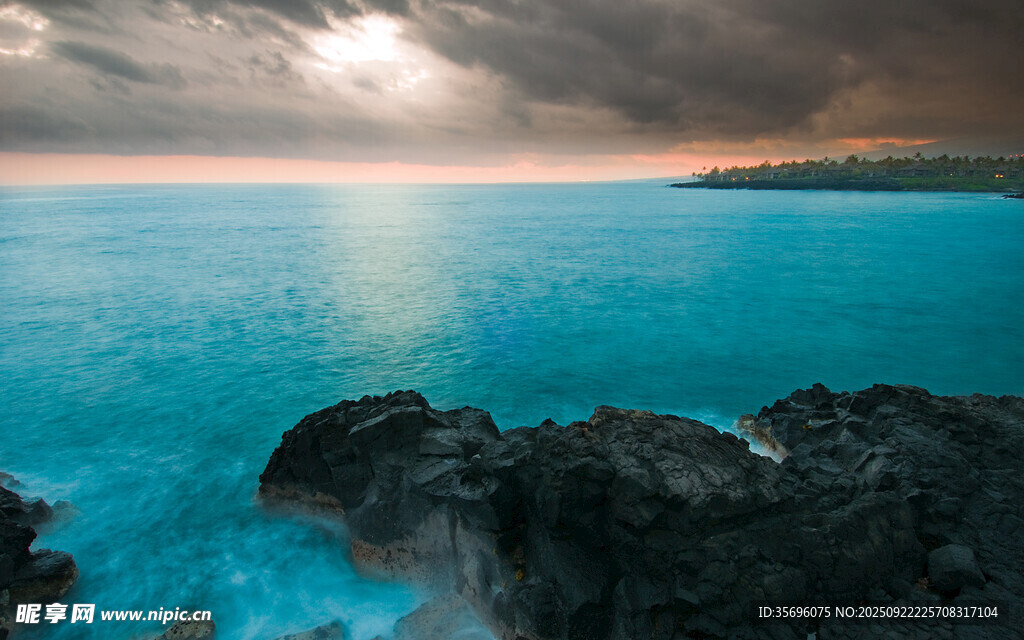 海边日落礁石美景