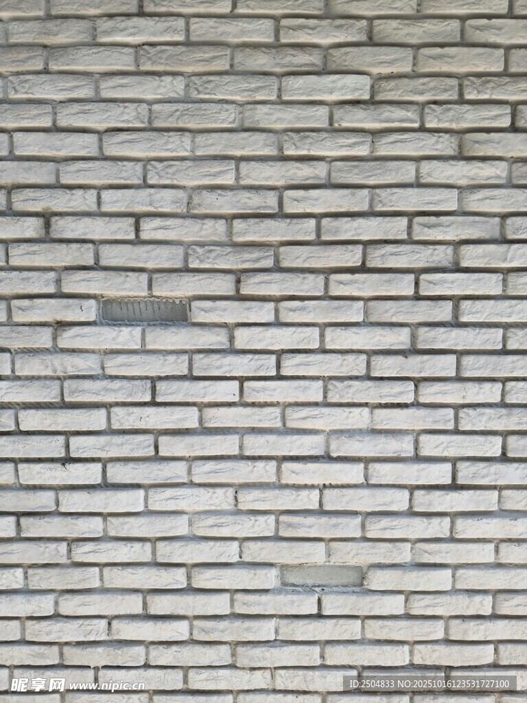 灰白砖墙纹理背景图