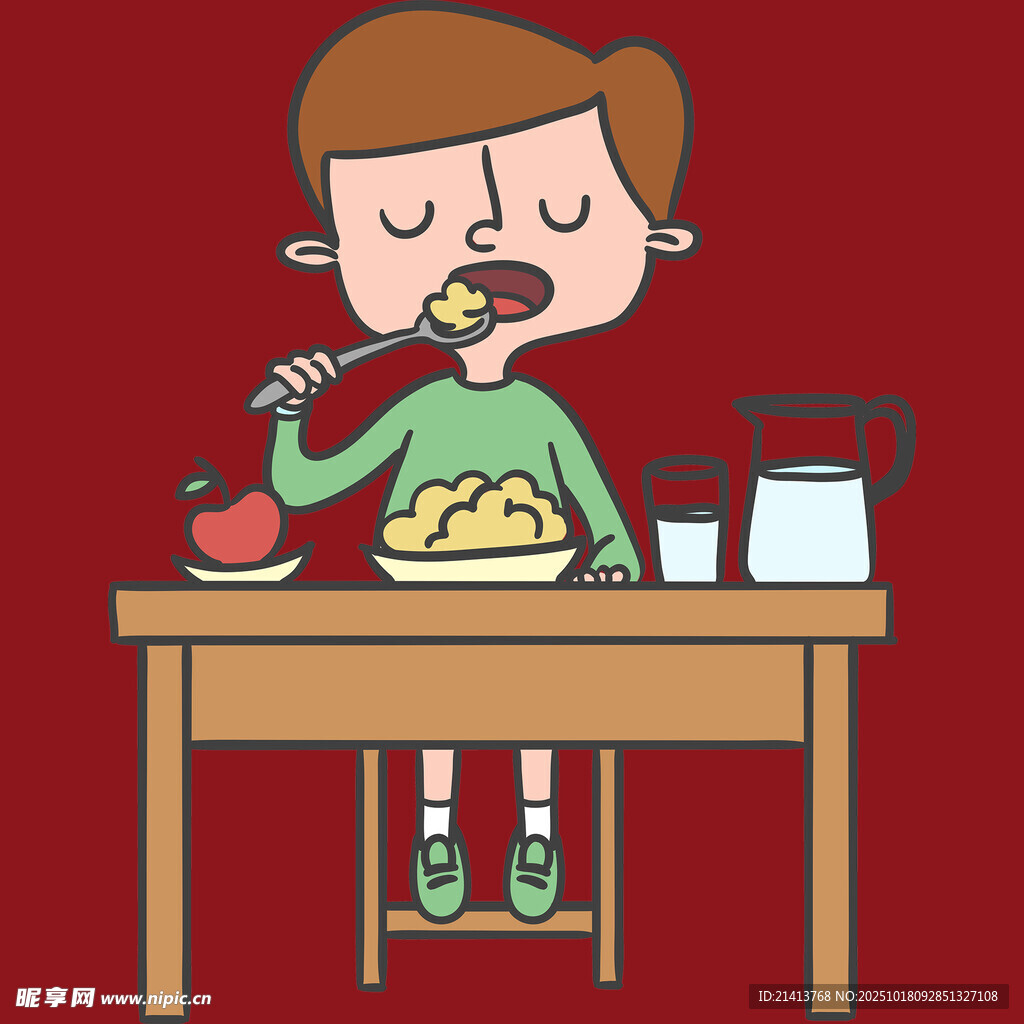 男孩坐在桌前开心用餐