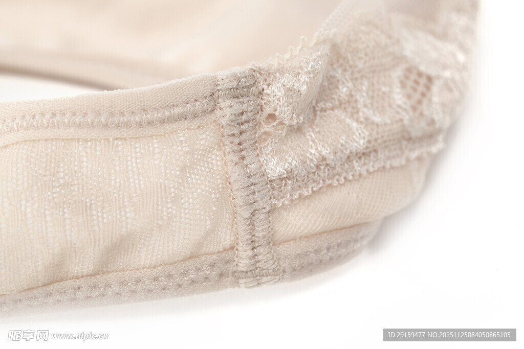 蕾丝装饰的米色衣物细节