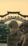 古桥石狮映黄昏