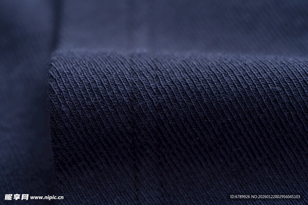 深蓝色斜纹布料特写