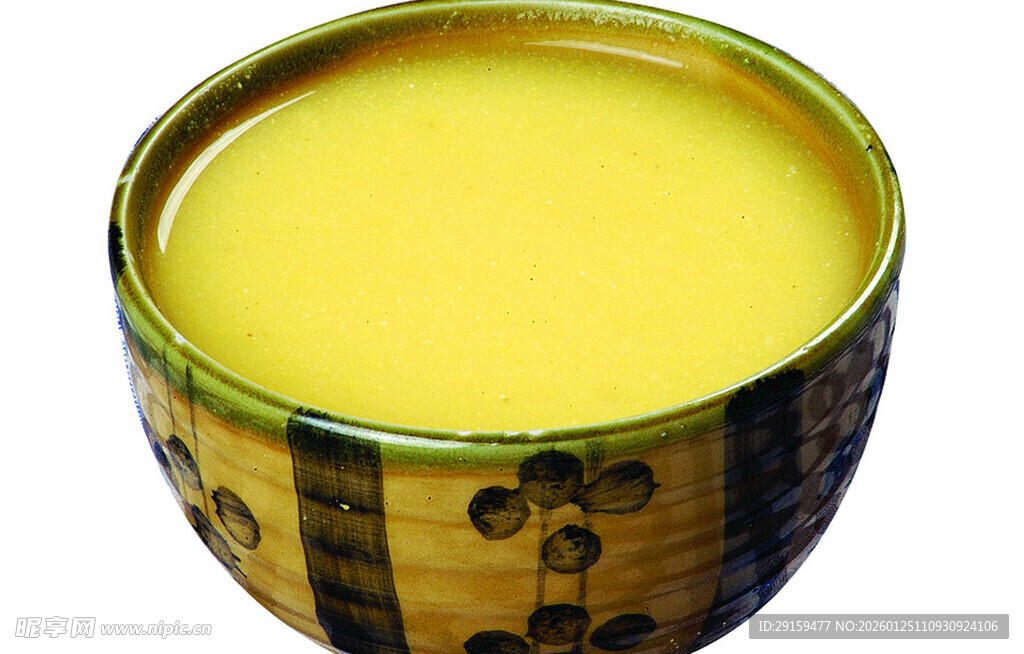 黄绿花纹碗中的黄色液体