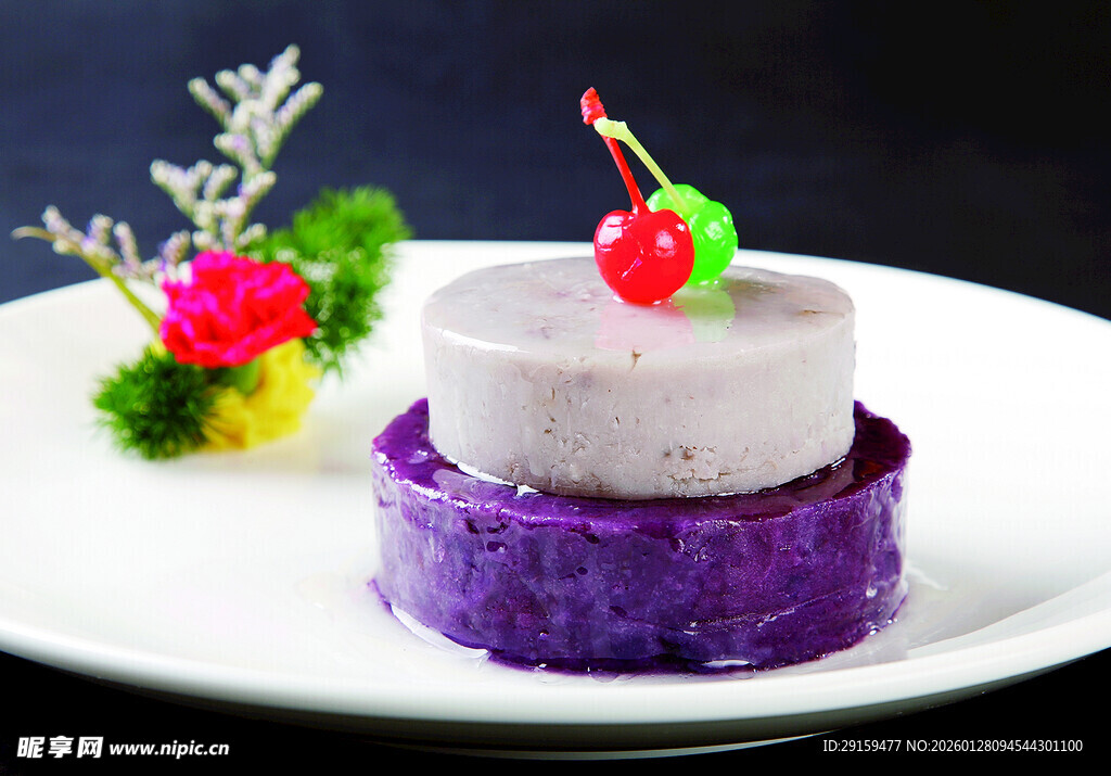 双色精致糕点配樱桃装饰