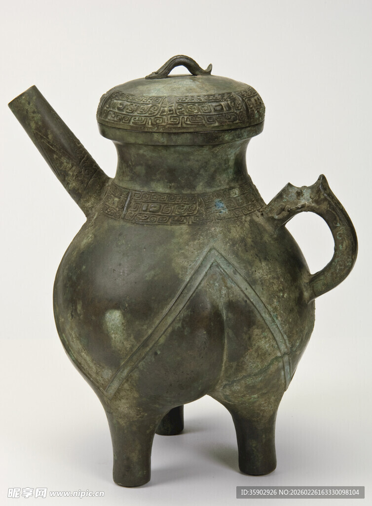 青铜三足带流壶