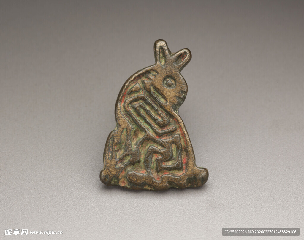 青铜蹲坐人形器