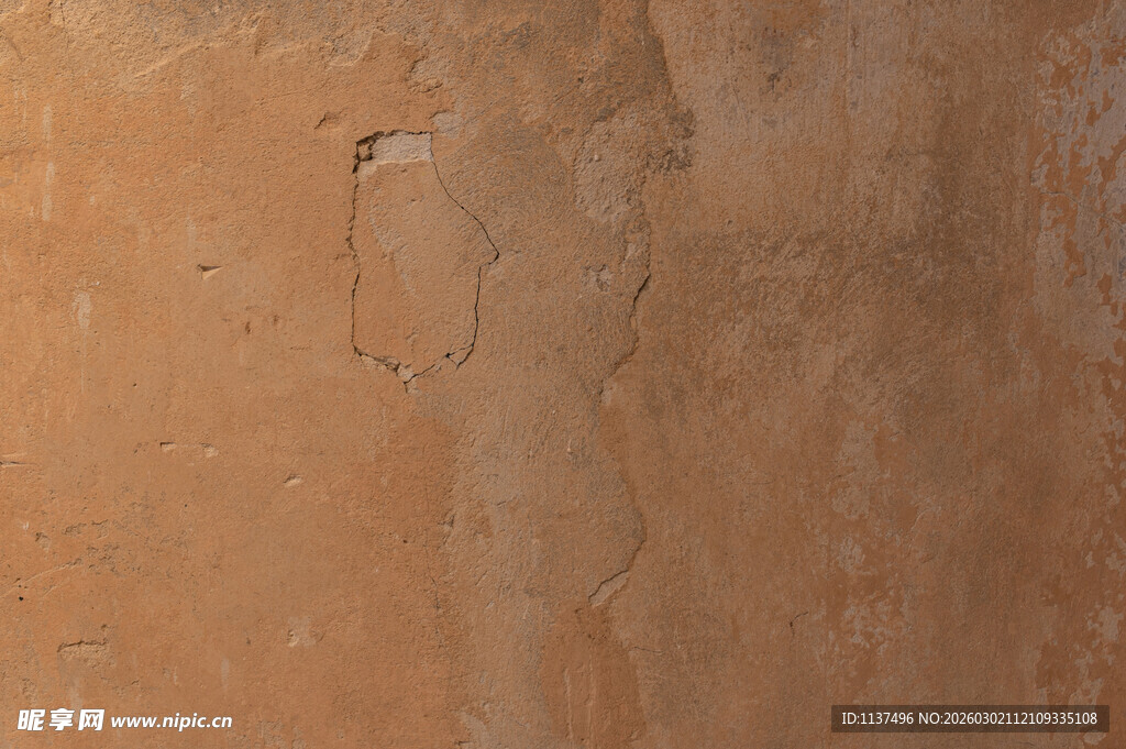 斑驳陈旧的土黄色墙面