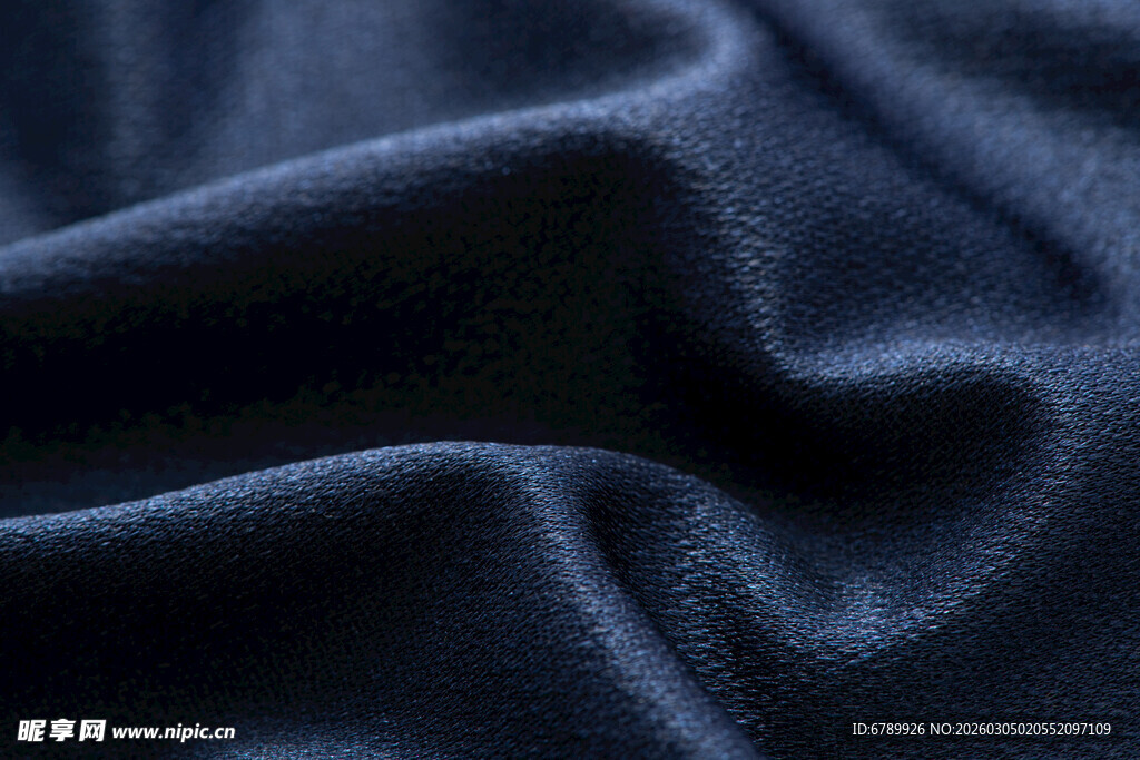 深蓝色褶皱织物纹理