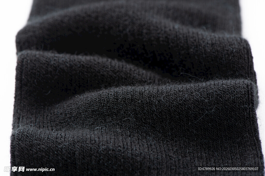 黑色褶皱织物纹理特写