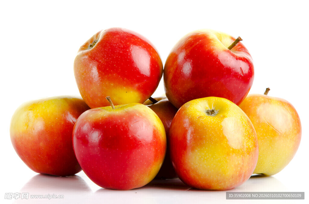 堆叠的鲜艳红黄苹果