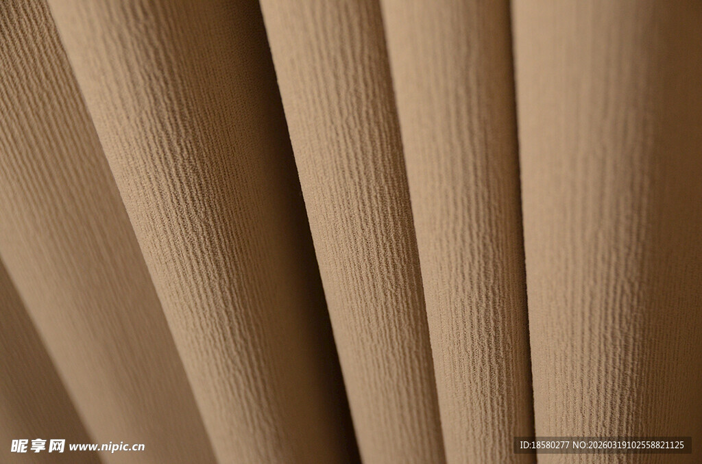 米色褶皱织物纹理特写