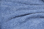 蓝色毛绒织物纹理特写