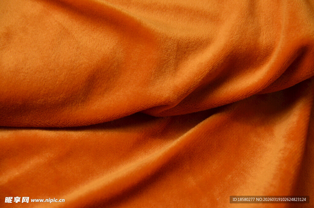 橙色绒面布料纹理特写