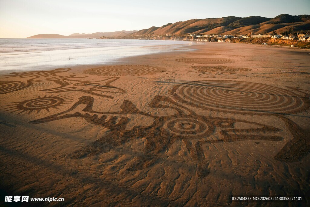 沙滩上的精美沙画艺术