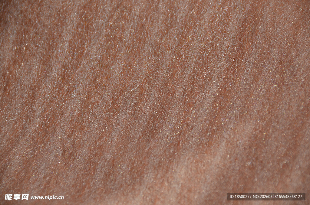 细腻棕红色纹理布料表面