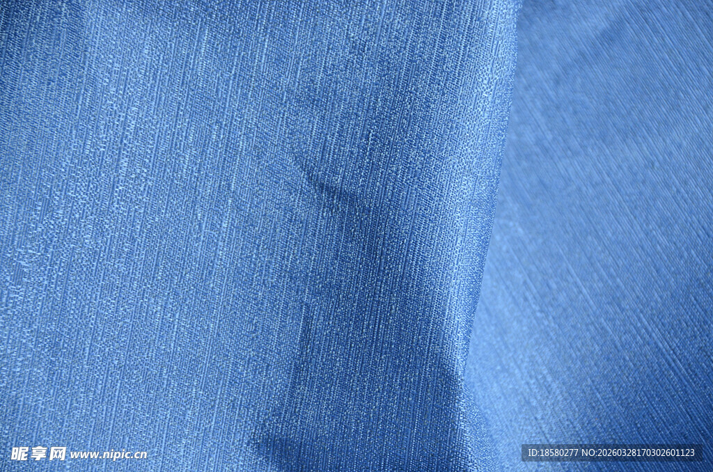 蓝色褶皱布料纹理特写
