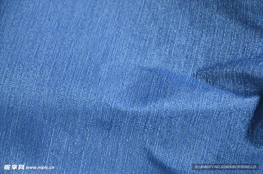 蓝色牛仔布料纹理特写