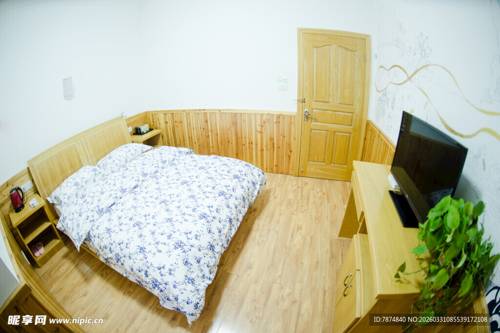 简约温馨木质风卧室一角