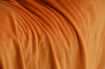 橙色褶皱毛绒 布料纹理特写