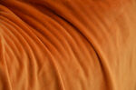 橙色毛绒 褶皱布料纹理特写