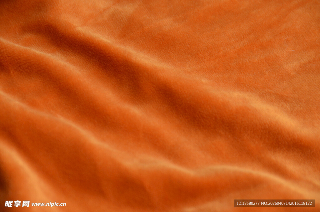 橙色褶皱布料纹理特写