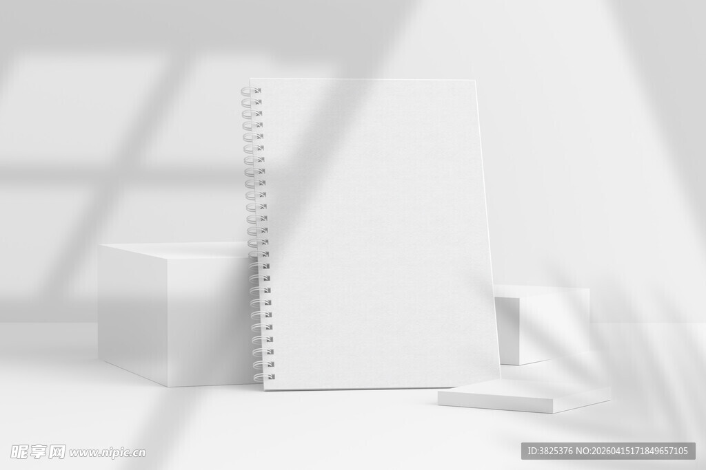 阴影下线圈笔记本设计展示样机