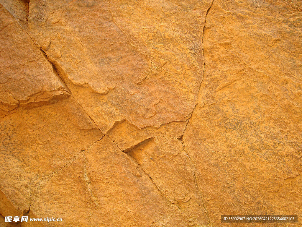 粗糙纹理的棕黄色岩石表面