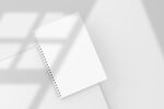 空白线圈笔记本与光影展示样机