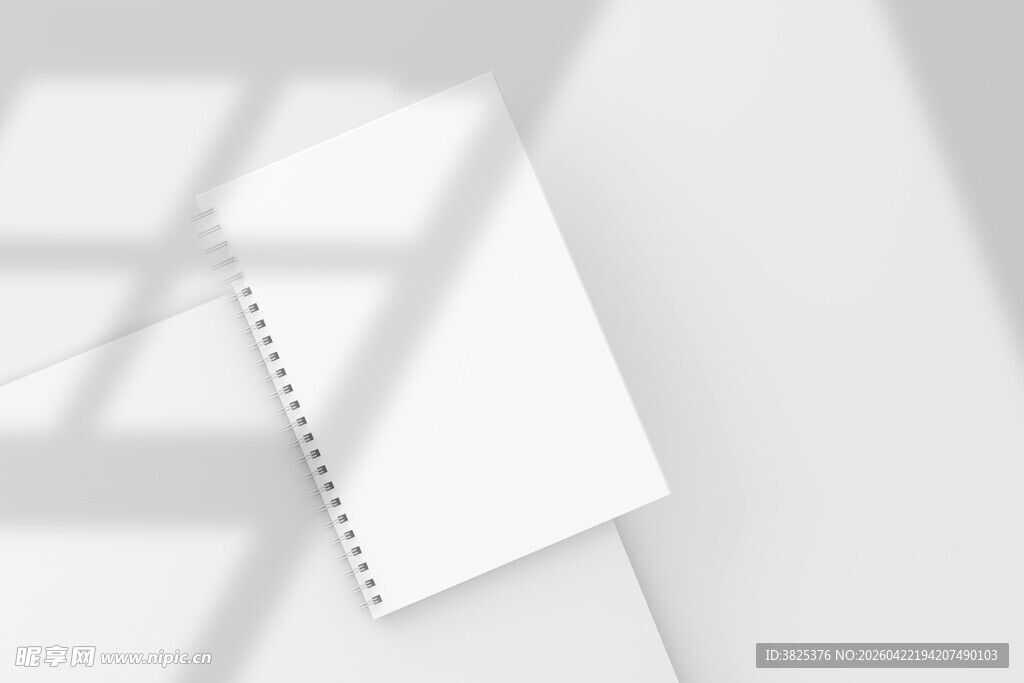 空白线圈笔记本与光影展示样机