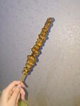 手持美味山药豆冰糖葫芦