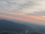 空中俯瞰绚丽晚霞与山峦