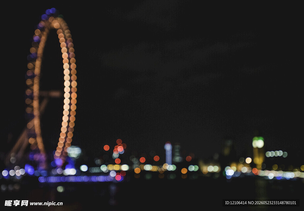 夜晚璀璨的摩天轮城市景观