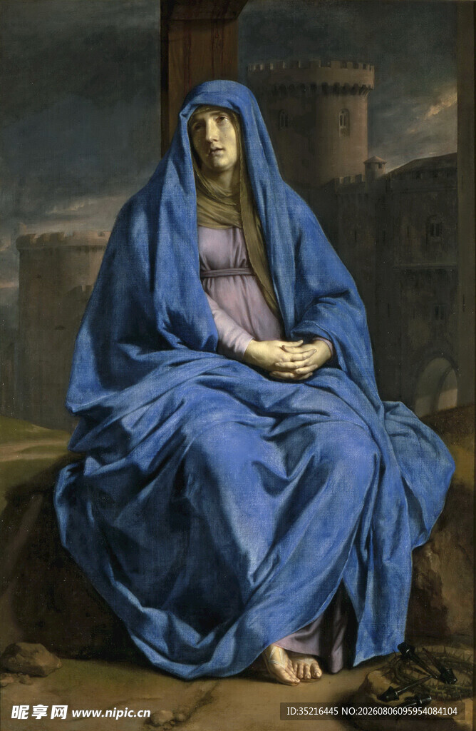 身着蓝袍的沉思女性