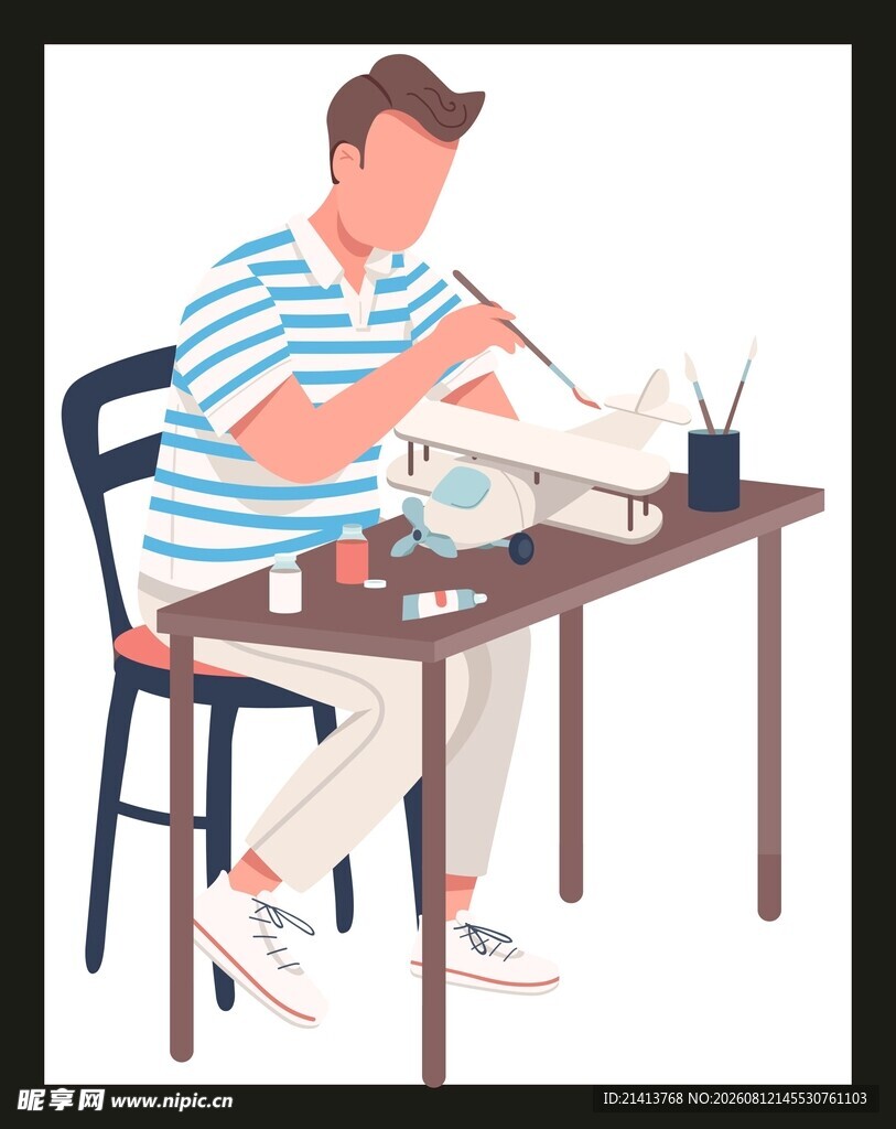 男子桌边专注手工制作