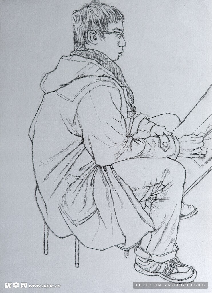 速写人物画画的男青年