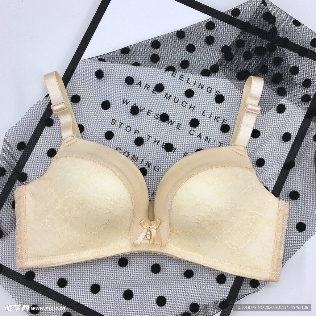 米色波点背景女士胸罩