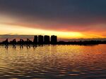 大庆时代广场湖岸黄昏城市剪影