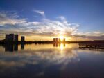 大庆时代广场湖面日出城市倒影