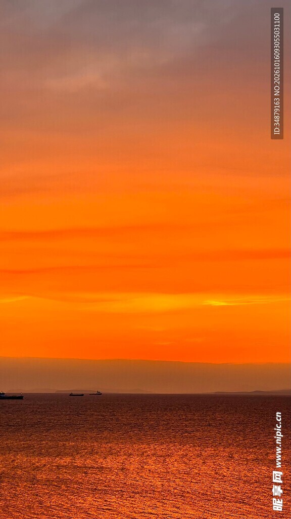 海上橙红日落美景
